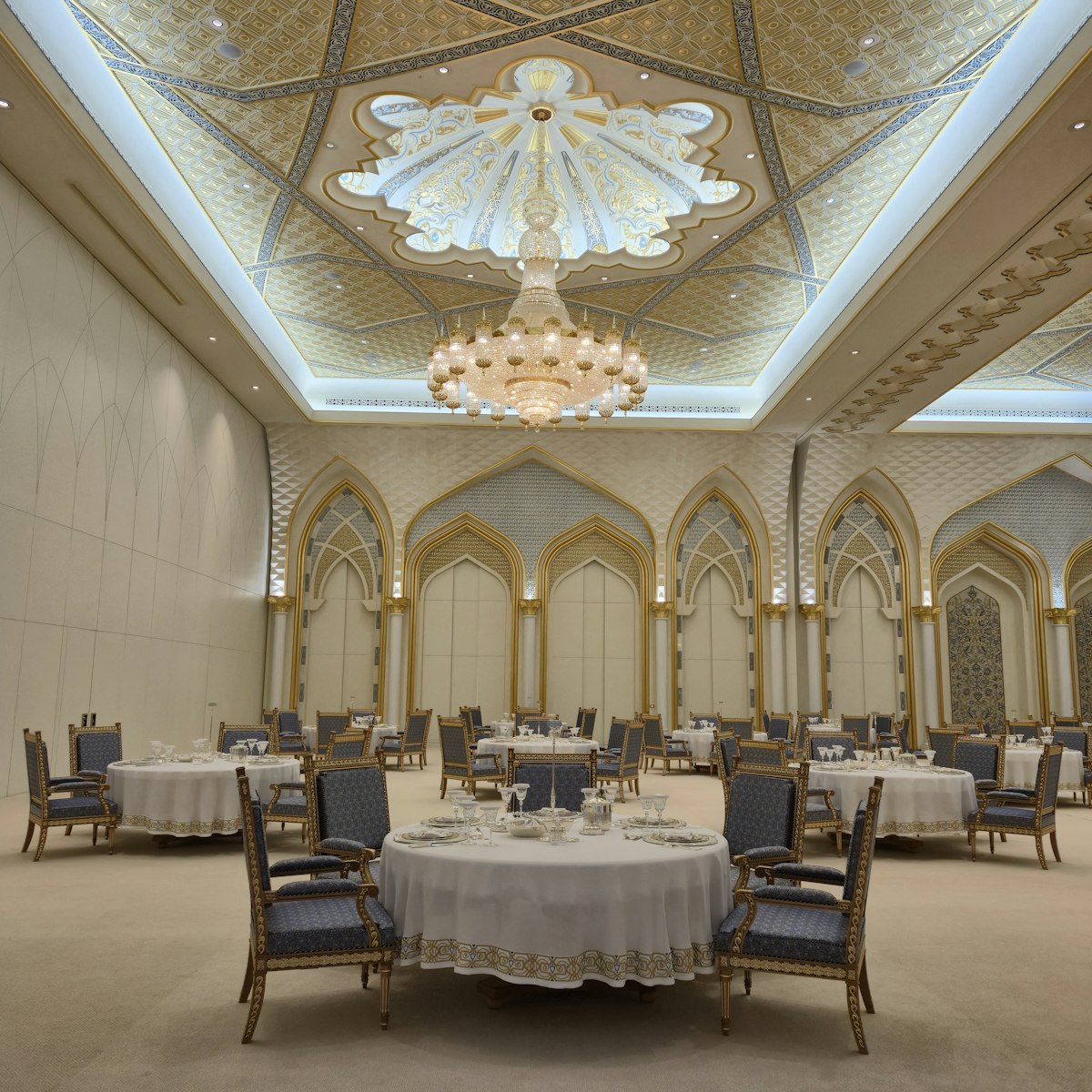 Ballroom wedding with elegantly draped reception linens